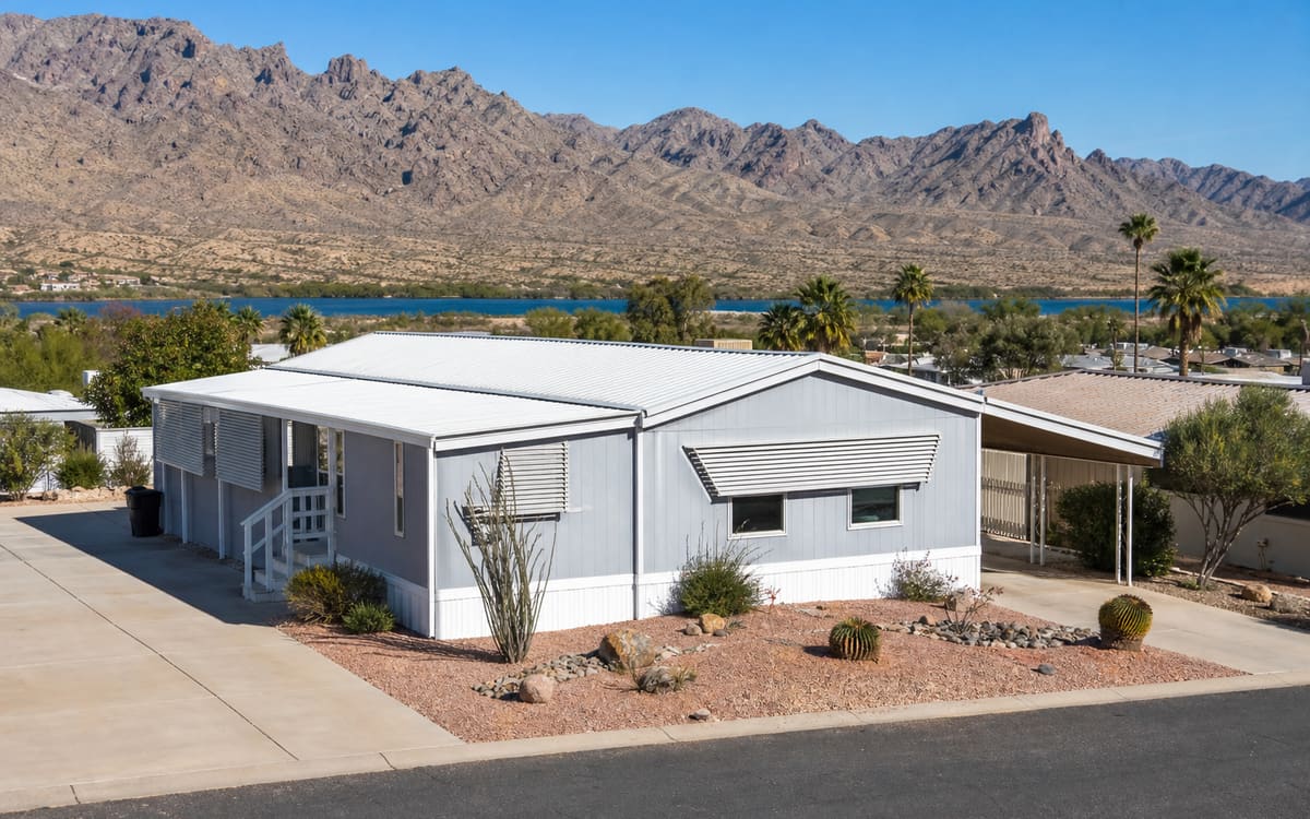 A manufactured home in a western Arizona river-valley community