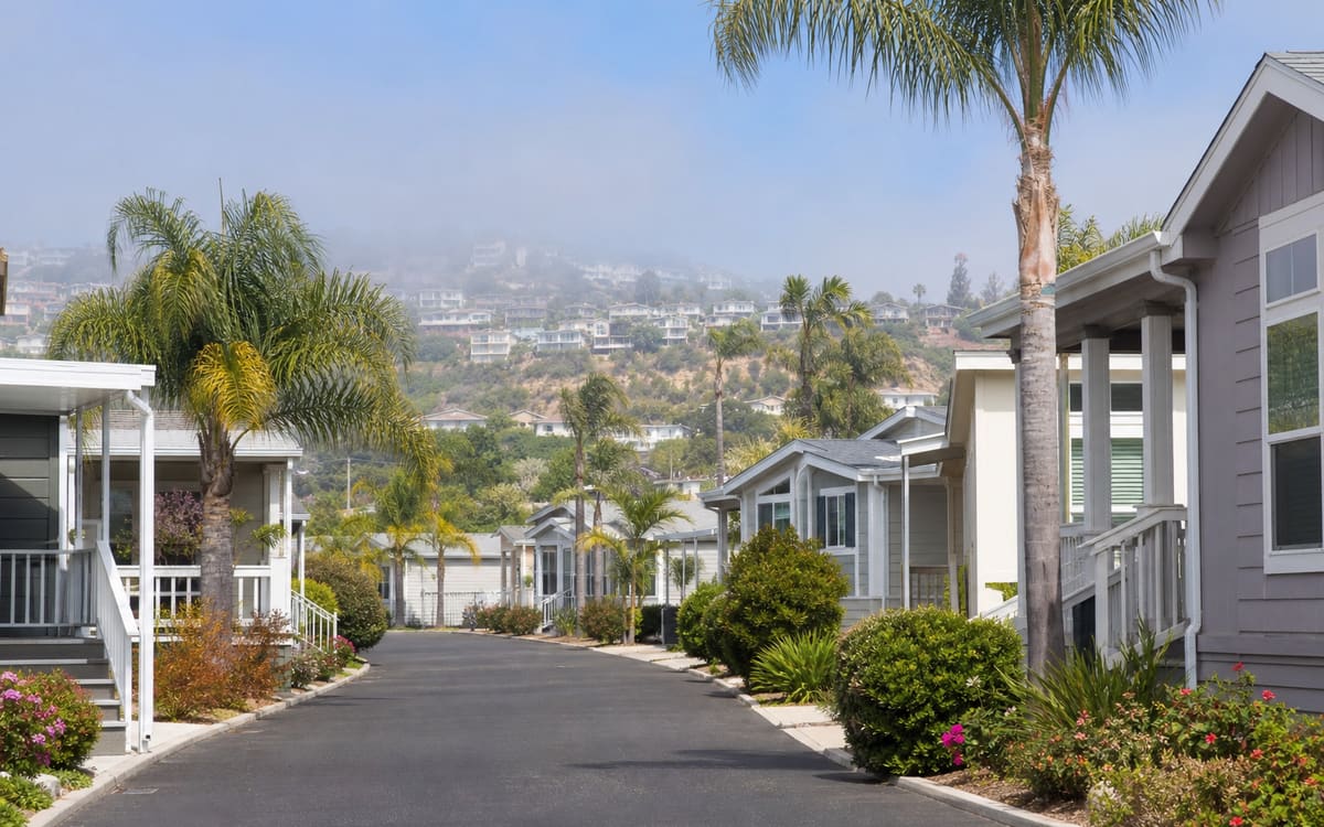 A neat manufactured home community lane in an urban coastal Southern California setting