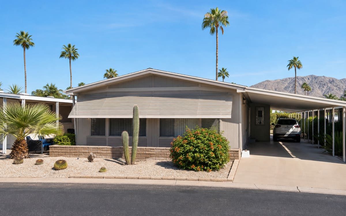A manufactured home in a Phoenix northwest-valley Arizona retirement community with immaculate desert landscaping