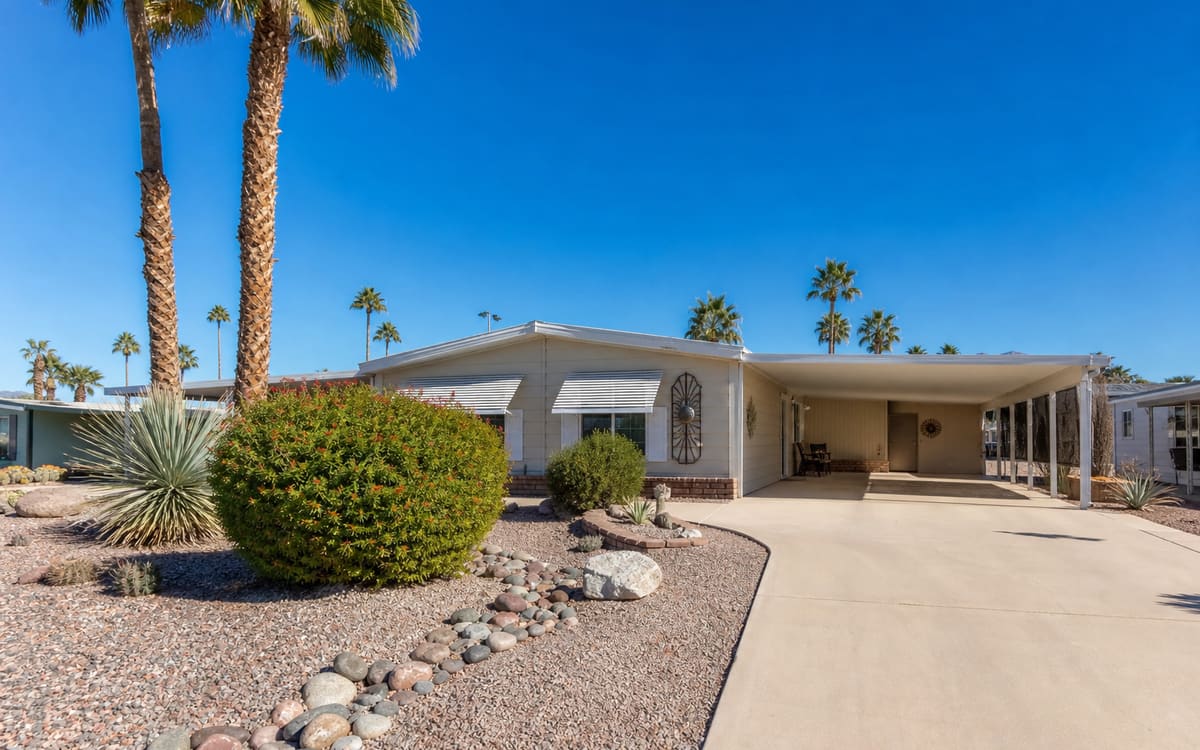 A manufactured home in a sunny southwestern Arizona desert community